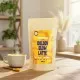 Golden Glow Latte por alakú ital csomagolása a The Botanist márkától, 250g kiszerelésben